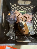 Crate with vase and small hurricane lamp
