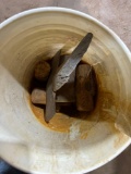 bucket of sledge hammer heads
