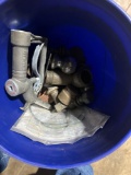 Bucket of various items to include a ball and water faucet items