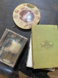 Bag of home decor items and pepper spray