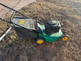 Push lawn mower with bag catch