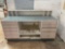 front desk counter with drawers and shelves