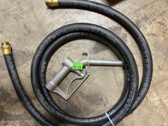 Fuel transfer hose with pump
