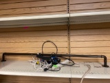 curtain rod; outlet power strip; wires