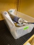 plastic tub with liquid nail and silicone
