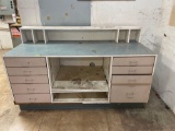 front desk counter with drawers and shelves