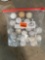 23 golf balls, 13 tees