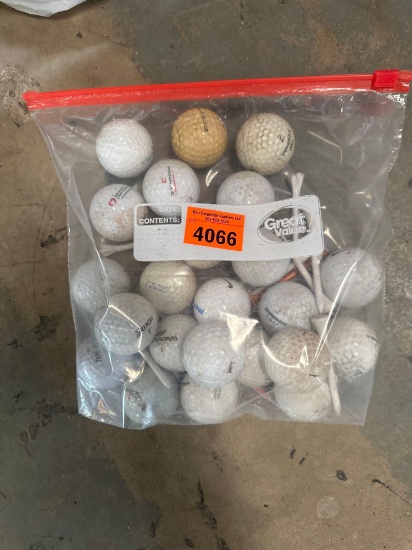 23 golf balls, 13 tees