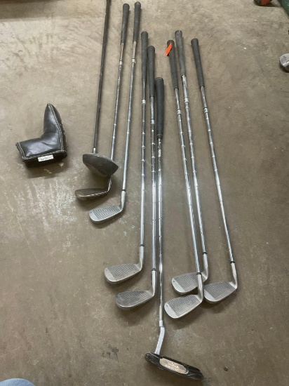 Golf clubs three through nine Puter and driver