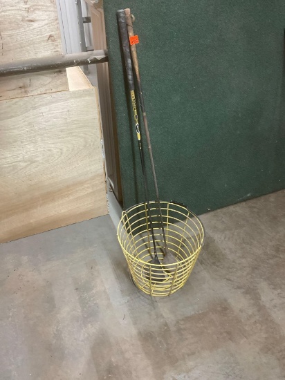 Golf clubs and a basket