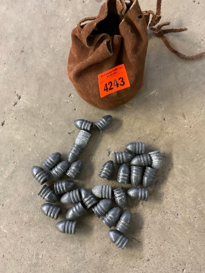 Lead bullets and a leather bag