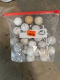 23 golf balls, 13 tees