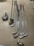 Golf clubs three through nine Puter and driver