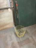 Golf clubs and a basket