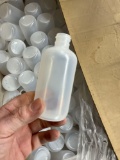 Box of sanitizing bottles, no lids