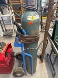 Settling oxygen torch, gauges, and bottle carrier