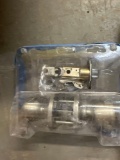 Door knobs and deadbolt not sure of all the parts are on that one. I do see keys and one deadbolt,