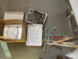Paint rollers, paint, pans, paint sticks