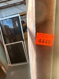 Solid door no handle in it. It is 36 x 84.
