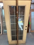 Glass door with wooden frame around it 36 x 79 1/4 in...