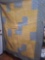 blue and yellow quilt