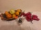 fake fruit, peppers and basket