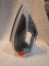 Steam iron with the cord that retracts into the iron base