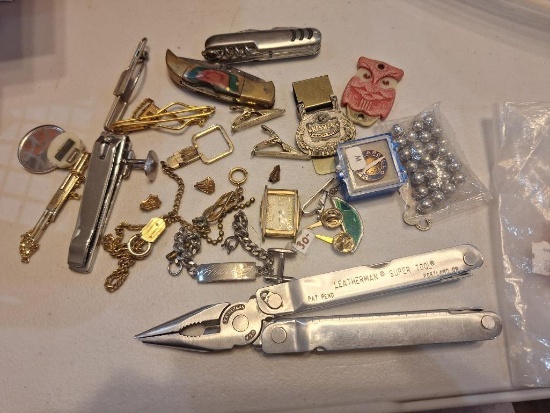 leatherman multitool- has damaged tip, pocket knives and misc