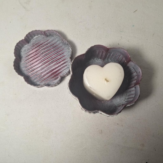 metal tin and candle