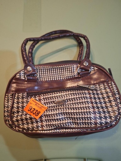 small clutch- size of a makeup bag