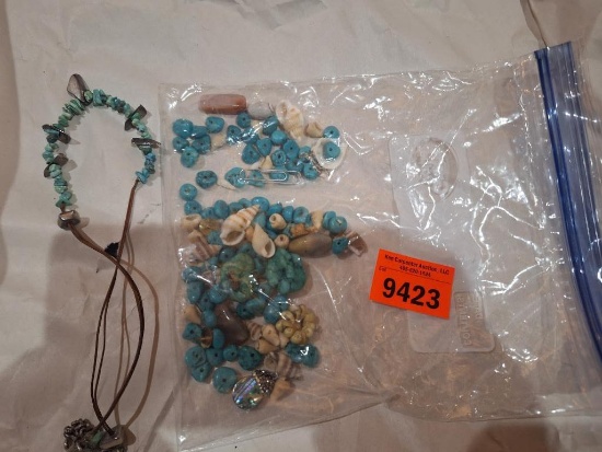 Broken jewelry pieces and a necklace