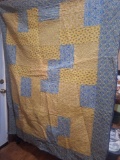 blue and yellow quilt