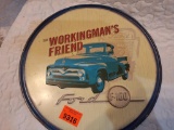 round metal Ford sign