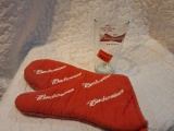budweiser glass and hot pad