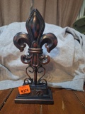Fleur de lis shelf decor