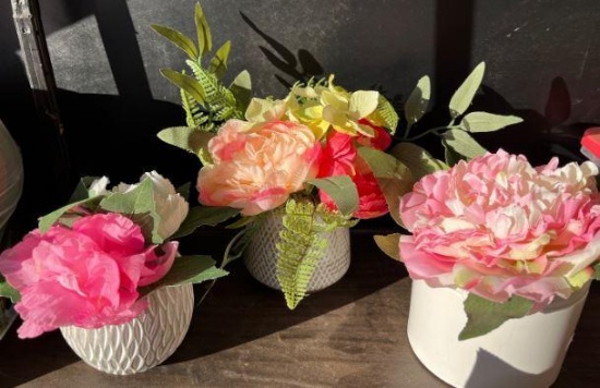3 small floral arrangements