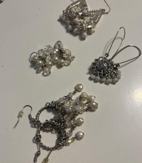 4 pairs of white/silver earrings