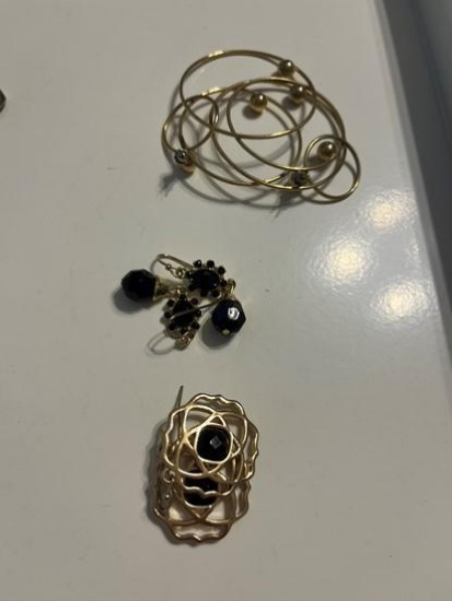 3 pairs of gold/black earrings