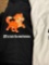 Two T-shirts see photos for sizes