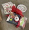 Empty Christmas box, ribbon, paper plates