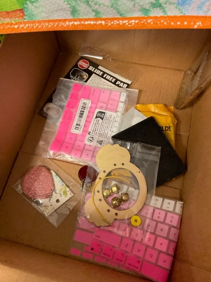Apple computer cover, white ball cap, stirrers, pencil sharpener, phone case & two pieces cucumber