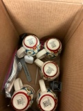 Six coffee cups, and silverware