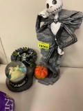 Halloween figurines and snow globe