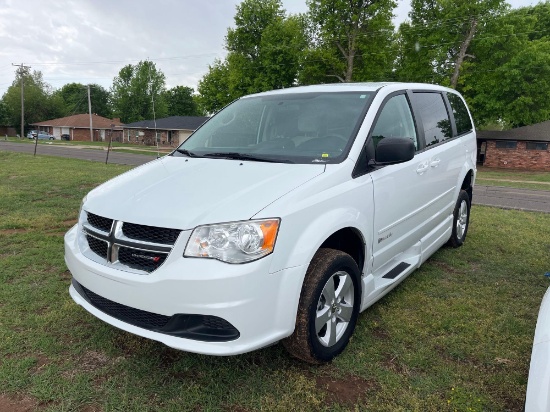 A- 2016 Dodge Grand Caravan with handicap lift
