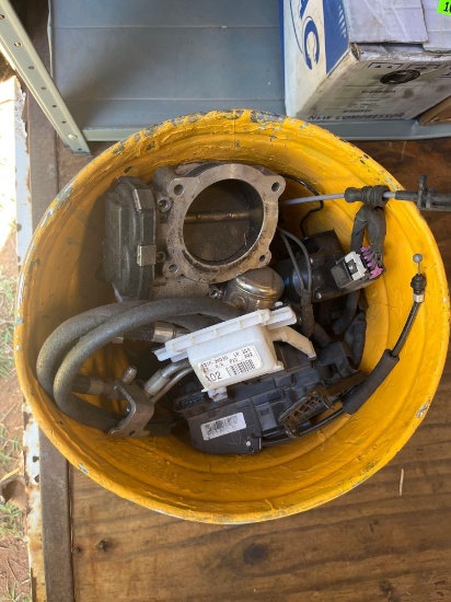 R- bucket of miscellaneous car parts