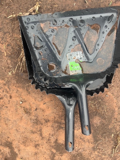 J- Two black steel dust pan's