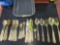 30 Piece Set of Ornate, Gold Toned Flatware and Serving Utensils.