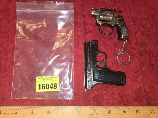 Pistol Lighters. Keychain.. Both one Money