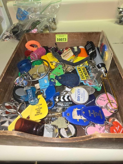 Wood Tray with Assorted Keychains and Other.