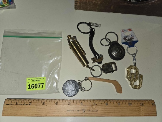 6 Assorted Keychains. 2 Oklahoma University, 1 Blazers Hockey, and Others. All one Money.